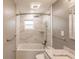 Newly remodeled bathroom with marble shower, a soaking tub, and modern fixtures at 3214 Amanda St, Punta Gorda, FL 33950