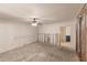 Under renovation living room with exposed walls and ceiling fan at 3214 Amanda St, Punta Gorda, FL 33950