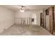 Under renovation living room with new flooring and ceiling fan at 3214 Amanda St, Punta Gorda, FL 33950