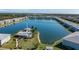 Aerial view of community pool and lake at 3310 Loveland Blvd # 1604, Punta Gorda, FL 33980