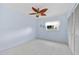 Bedroom with ceiling fan and light walls at 3310 Loveland Blvd # 1604, Punta Gorda, FL 33980