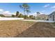 Large backyard with a swimming pool at 3450 Moravia Ave, North Port, FL 34286