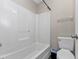 Bathroom with shower/tub combo and toilet at 3450 Moravia Ave, North Port, FL 34286