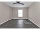 Bright bedroom with tile floors and neutral walls at 3450 Moravia Ave, North Port, FL 34286