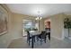 Dining area with a marble table and access to the pool area at 3723 Tripoli Blvd, Punta Gorda, FL 33950