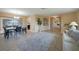 Open living and dining area with light flooring and neutral decor at 3723 Tripoli Blvd, Punta Gorda, FL 33950