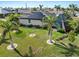 Aerial view of home with solar panels and pool at 3937 Bal Harbor Blvd, Punta Gorda, FL 33950