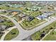 Aerial view of single Gathering home and neighborhood at 3937 Bal Harbor Blvd, Punta Gorda, FL 33950