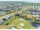 Aerial view of a luxury home community with golf course and waterfront access at 3937 Bal Harbor Blvd, Punta Gorda, FL 33950