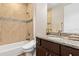 Bathroom with granite countertop, modern vanity, and shower/tub combo at 3937 Bal Harbor Blvd, Punta Gorda, FL 33950