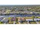 Wide aerial view of canal-front home and neighborhood at 4107 Rock Creek Dr, Port Charlotte, FL 33948