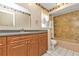 Bathroom with vanity, shower/tub combo and tiled floor at 4107 Rock Creek Dr, Port Charlotte, FL 33948