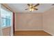 Bright bedroom with wood floors, ceiling fan, and window at 4107 Rock Creek Dr, Port Charlotte, FL 33948