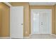 Bedroom with tile floors, french doors and closet at 4107 Rock Creek Dr, Port Charlotte, FL 33948