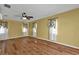 Bright bedroom with wood flooring and ceiling fan at 4107 Rock Creek Dr, Port Charlotte, FL 33948