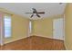 Bedroom with wood floors and ceiling fan at 4107 Rock Creek Dr, Port Charlotte, FL 33948