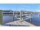 Private boat lift and dock on the canal at 4107 Rock Creek Dr, Port Charlotte, FL 33948