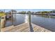 View of the canal from a wooden dock at 4107 Rock Creek Dr, Port Charlotte, FL 33948