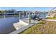 Wooden dock provides water access at 4107 Rock Creek Dr, Port Charlotte, FL 33948