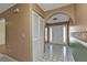 Bright entryway with tiled floors and neutral-toned walls at 4107 Rock Creek Dr, Port Charlotte, FL 33948