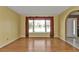 Living room featuring hardwood floors and a large window with view at 4107 Rock Creek Dr, Port Charlotte, FL 33948