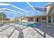 Spacious pool and patio area with covered lanai at 4107 Rock Creek Dr, Port Charlotte, FL 33948