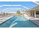 Inviting swimming pool with screened enclosure at 4107 Rock Creek Dr, Port Charlotte, FL 33948