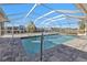 Relaxing screened pool area with paver deck at 4107 Rock Creek Dr, Port Charlotte, FL 33948