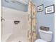 Bathroom with a shower and toilet at 4198 Kinlock St, North Port, FL 34286