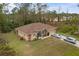 Aerial view of house with driveway and two cars at 4258 Mermell Cir, North Port, FL 34291