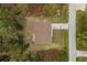 Housetop view of single-story house with driveway and yard at 4258 Mermell Cir, North Port, FL 34291