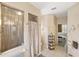 Bathroom with shower, vanity, and ample storage at 4258 Mermell Cir, North Port, FL 34291