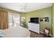 Serene bedroom with dresser and a ceiling fan at 4258 Mermell Cir, North Port, FL 34291