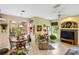 Bright dining area with table and chairs, opens to the kitchen at 4258 Mermell Cir, North Port, FL 34291