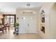 Spacious entryway with double doors and decorative niches at 4258 Mermell Cir, North Port, FL 34291