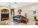 Cozy living room features a comfortable couch and large TV at 4258 Mermell Cir, North Port, FL 34291