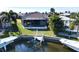 Aerial view of property showing canal access and pool at 432 Gun Cay Ln, Punta Gorda, FL 33950