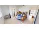 Well-lit bedroom featuring a bunk bed and a workspace at 432 Gun Cay Ln, Punta Gorda, FL 33950