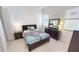 Cozy bedroom with a full-size bed and dark wood dresser at 432 Gun Cay Ln, Punta Gorda, FL 33950