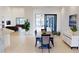 Dining room with table and chairs, view of pool and living room at 432 Gun Cay Ln, Punta Gorda, FL 33950