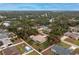 Aerial view of single-Gathering home with backyard and shed at 4401 Boeing Ln, North Port, FL 34287