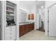 Bathroom with double vanity and linen closet at 4401 Boeing Ln, North Port, FL 34287