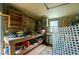 Workshop with workbench and various tools at 4401 Boeing Ln, North Port, FL 34287