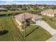 Aerial view showcasing the home's canal-front location at 45 Marker Rd, Rotonda West, FL 33947