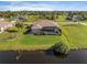 Aerial view of property showcasing the pool and backyard at 45 Marker Rd, Rotonda West, FL 33947