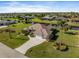 Bird's-eye view of a house near water, showcasing the property and neighborhood at 45 Marker Rd, Rotonda West, FL 33947