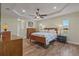 Spacious bedroom with wood flooring and ceiling fan at 45 Marker Rd, Rotonda West, FL 33947