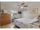 Cozy bedroom with a starfish comforter and built-in dresser at 45 Marker Rd, Rotonda West, FL 33947