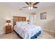 Charming bedroom with starfish bedding and wood dresser at 45 Marker Rd, Rotonda West, FL 33947