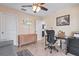 Home office with built-in cabinets and modern desk setup at 45 Marker Rd, Rotonda West, FL 33947